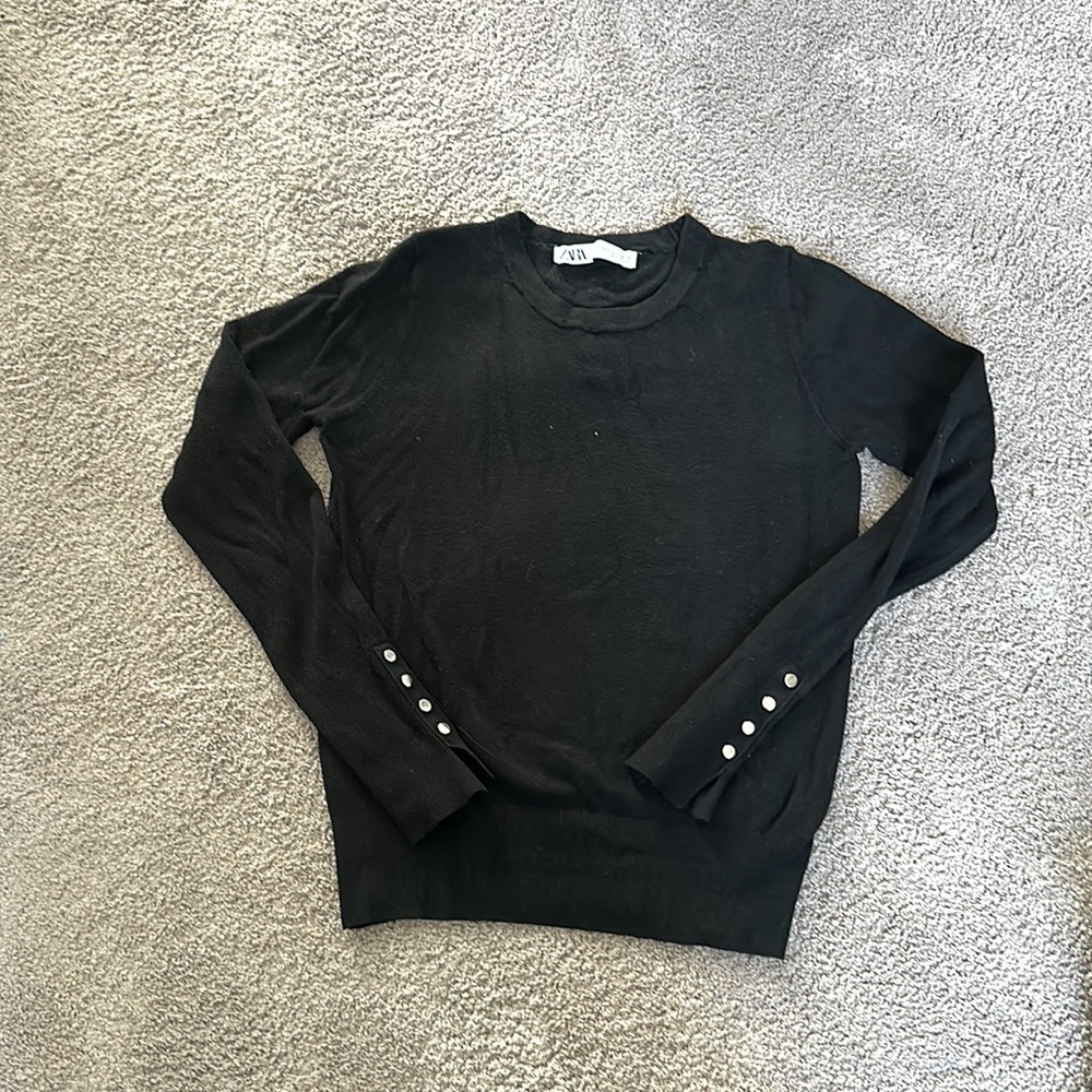Black crew neck sweater